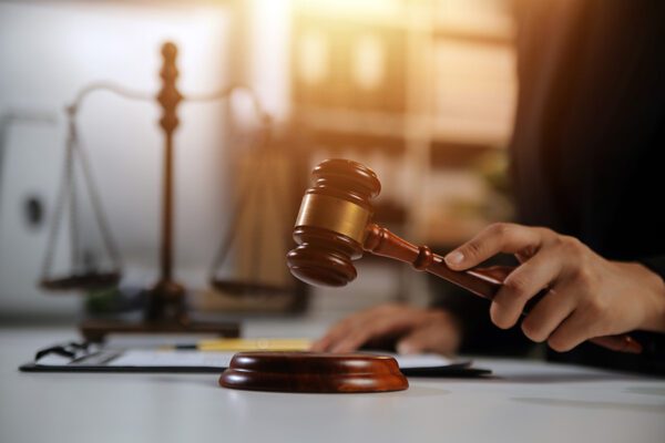 Photograph of a judge holding a gavel.